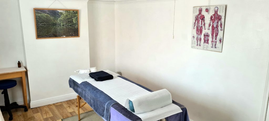 Massage table in Phil Hall's contemporary massage room.